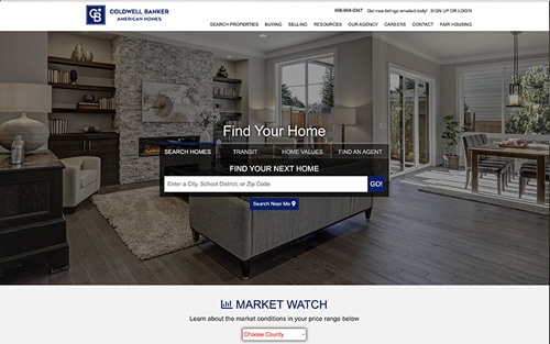 Coldwell Banker American Homes website homepage &mdash; a warm styled living room with a property search bar over Search Homes, Transit, Home Values, and Find an Agent tabs.