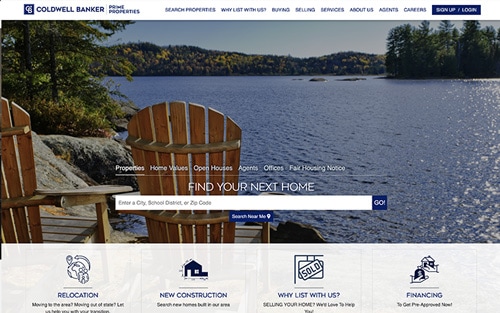 Coldwell Banker Prime Properties website homepage &mdash; an Adirondack chair overlooking a lake with a property search bar over Properties, Home Values, and Agents tabs.